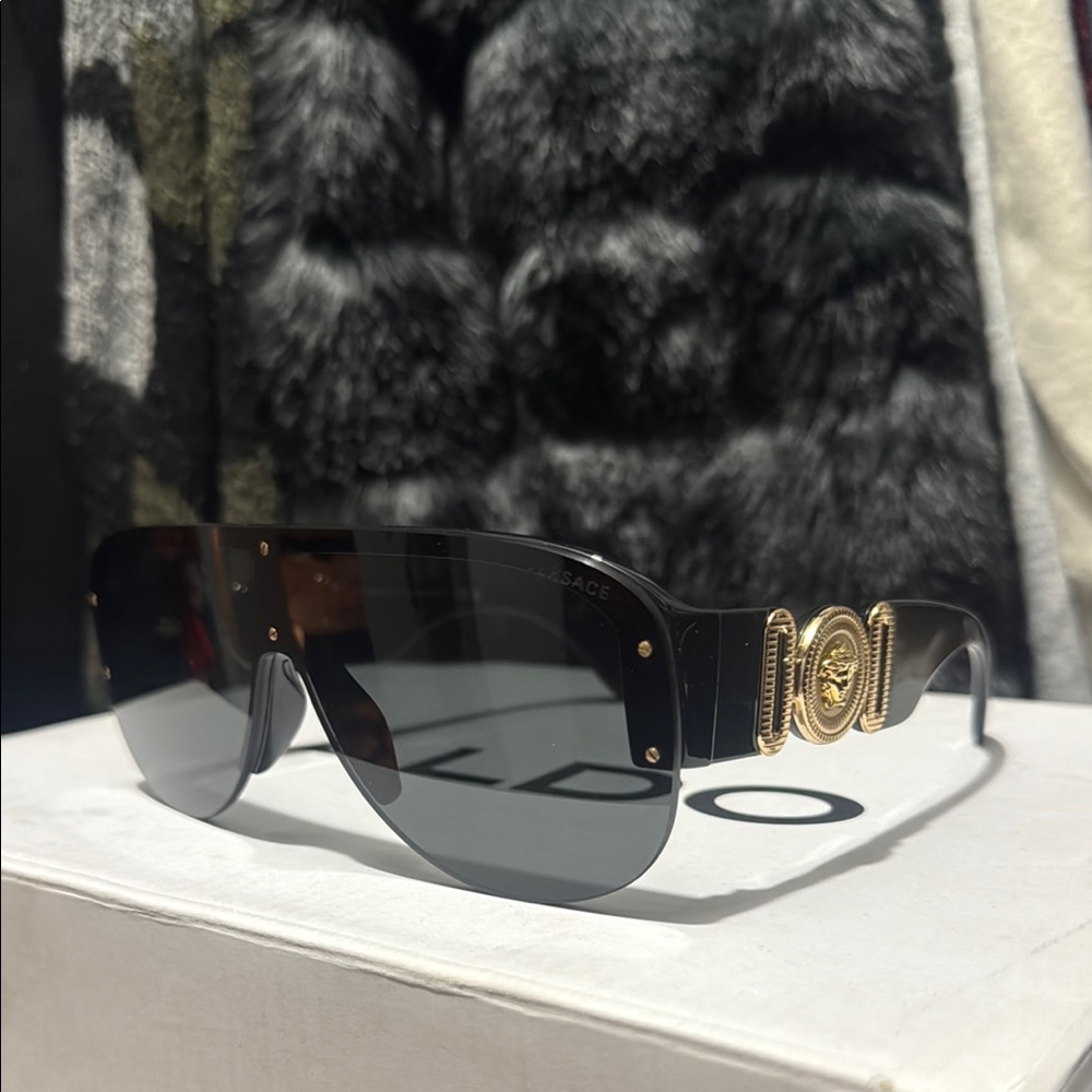 Versace Sunglasses with Black Lenses and Gold Medallion